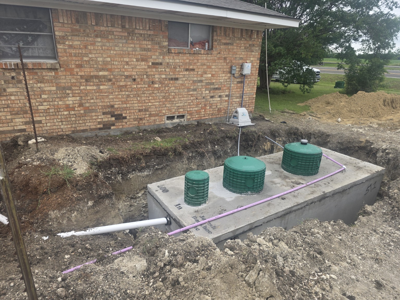 Installed septic tanks and prepared site on a Sadler project
